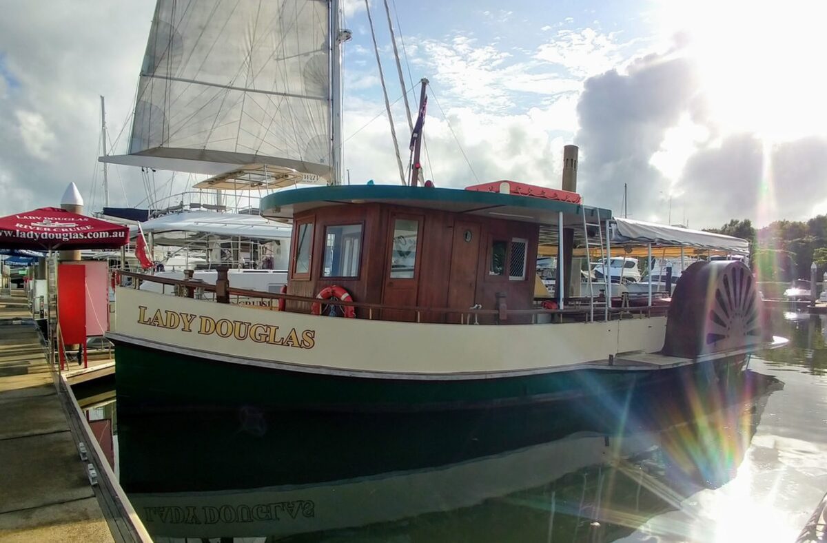 Port Douglas crocodile spotting boat in marina