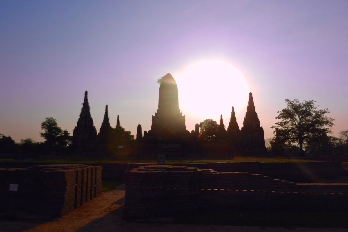 Sunset temple view from Ayutthaya river cruise boat.