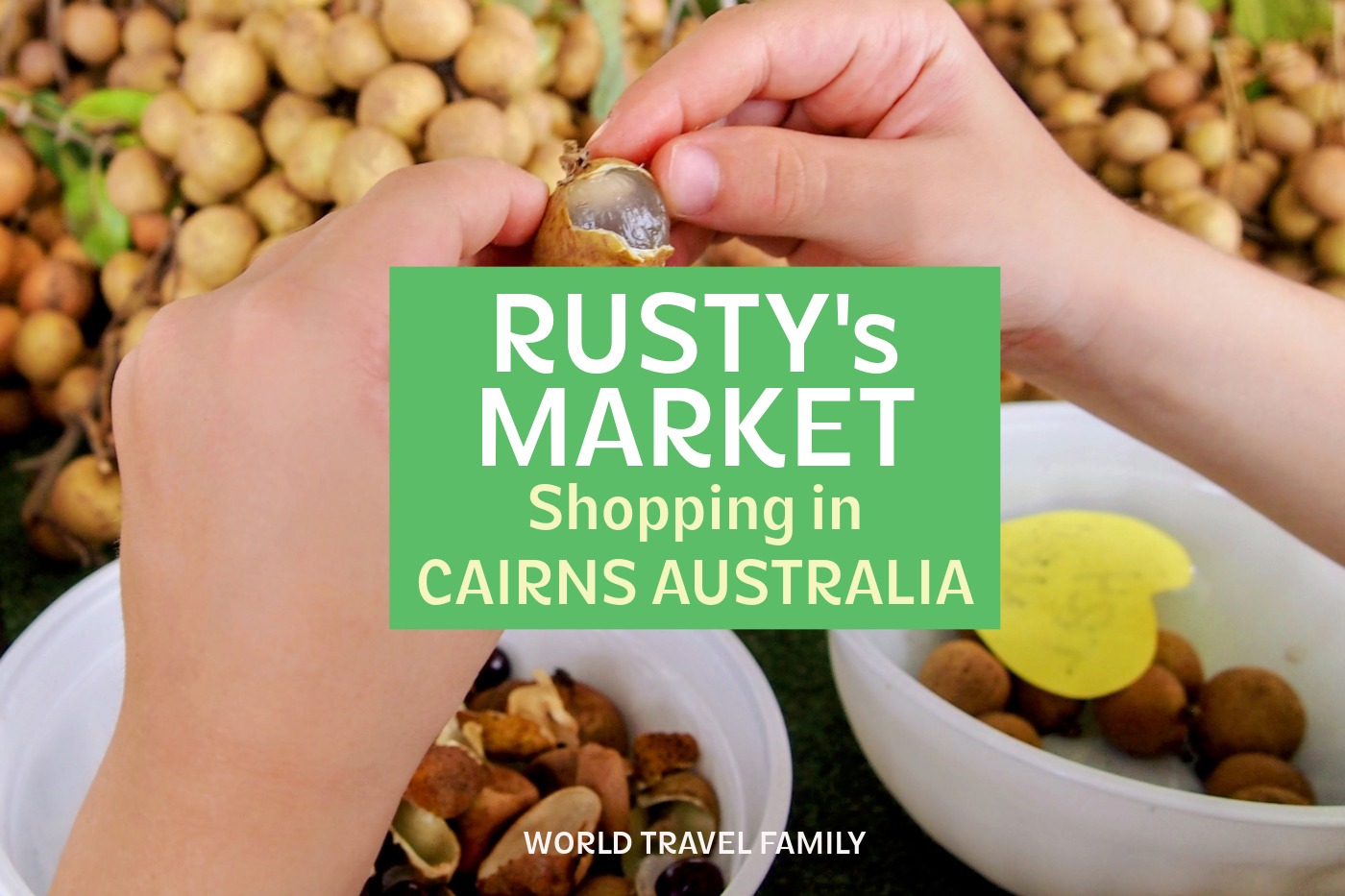 Photo of tropical fruit at Rusty's Market Cairns. Text reads "Rusty's Market, Shopping in Cairns Australia