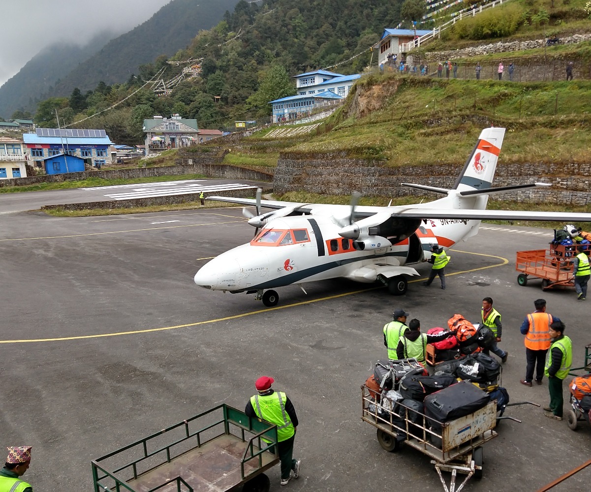 Kathmandu to Lukla baggae handlers Lukla runway