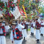 Hoteni Maramures, & The Tanjaua traditional romanian costume. men taking part in the ploughing festival in hoteni maramures