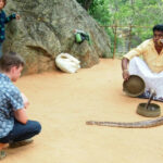 Sri Lanka with Kids. Family Travel Guide! Children watching a snake charmer in sri lanka