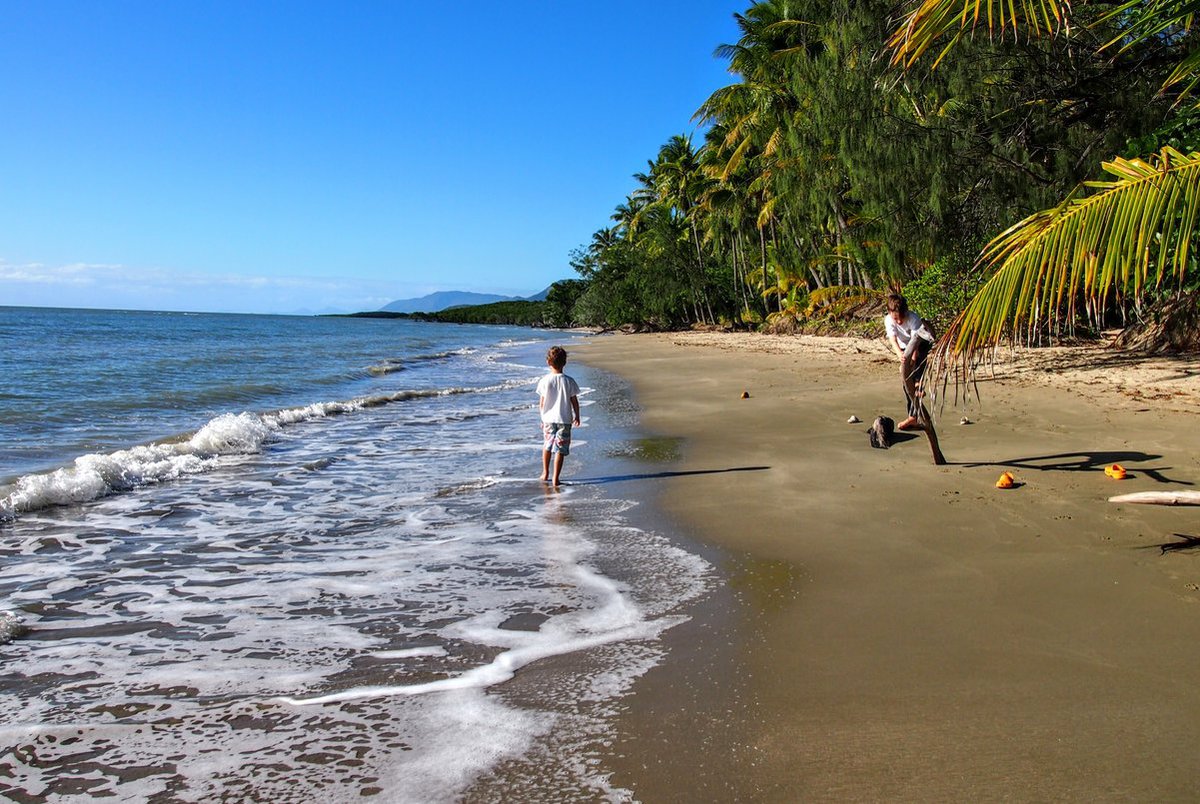 children playing in the water Four Mile Beach Port Douglas