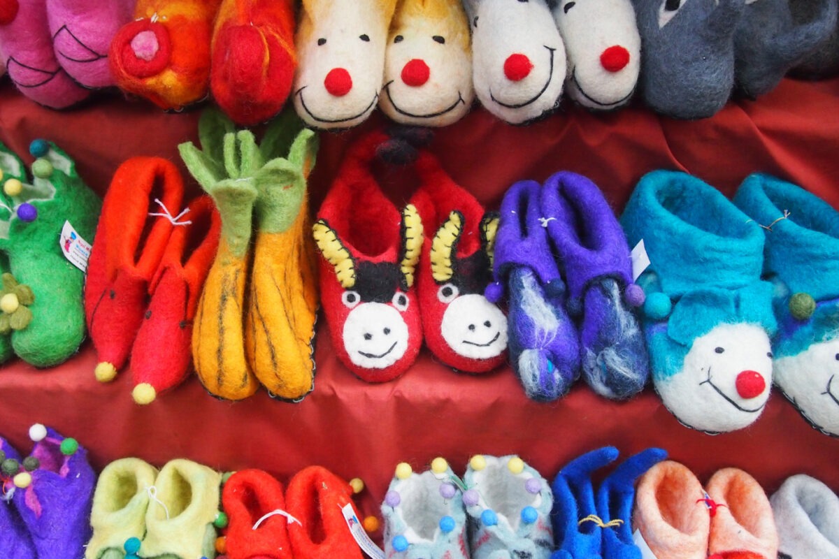 Felted children's shoes or slippers, colourful bootees with faces,