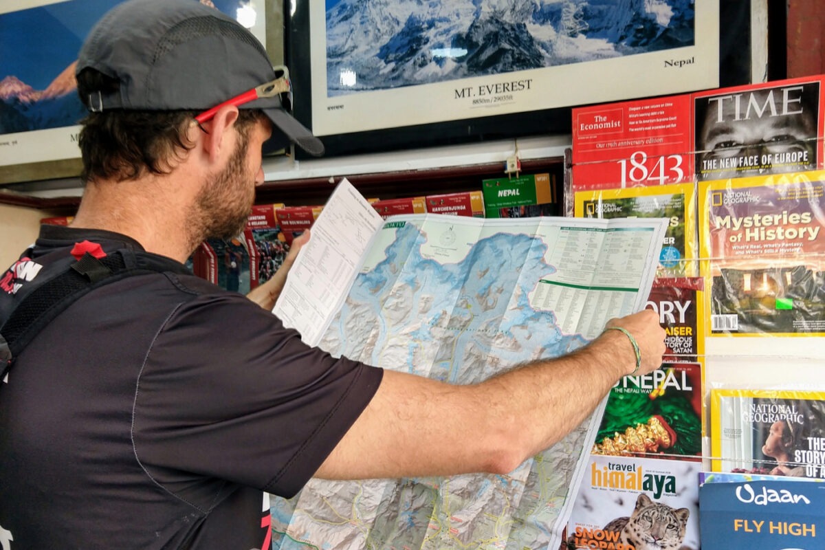 Shopping for maps in a small shop in Thamel Kathmandu