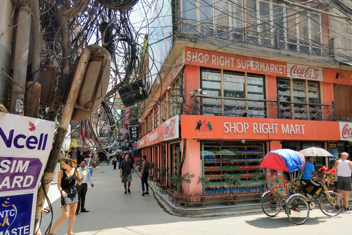 Supermarket on a street corner in Thamel Kathmandu. The shop name "Shop Right Supermarket."