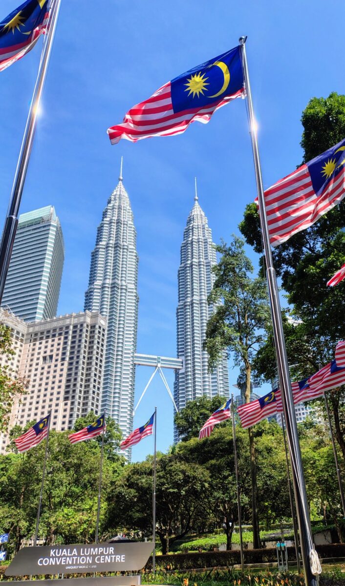 KLCC pghoto of towers and malaysian flags at KLCC convention centre